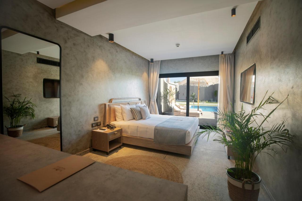Sunrise Tucana Resort Grand Select Hurghada Exterior foto A bedroom at the hotel
