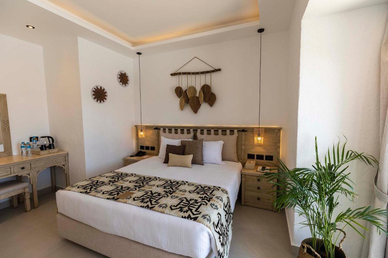 Sunrise Tucana Resort Grand Select Hurghada Exterior foto A bedroom at the hotel